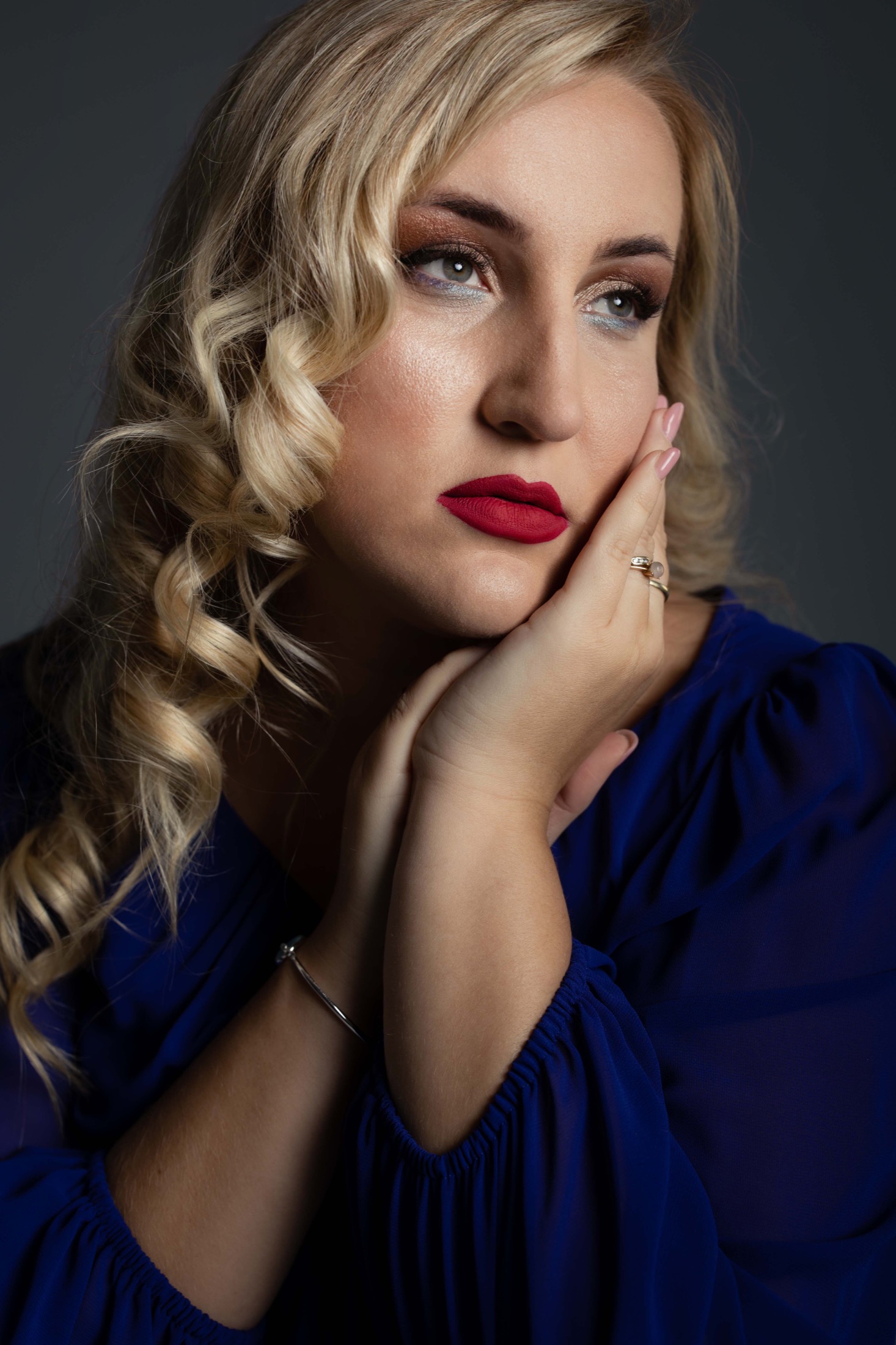 Close portrait of Jovana Filipović Ćalić in blue dress